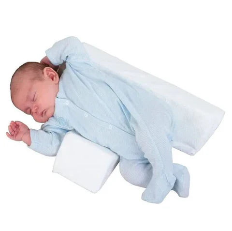 Portable adjustable anti-roll baby side sleep pillow, lightweight & compact for newborn travel and easy baby care.
