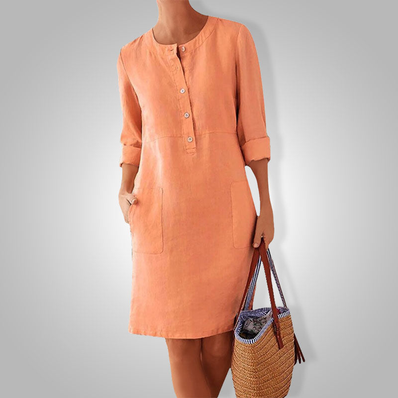 Detail of the vibrant color and soft cotton fabric of the Nika women's loose fit summer dress.