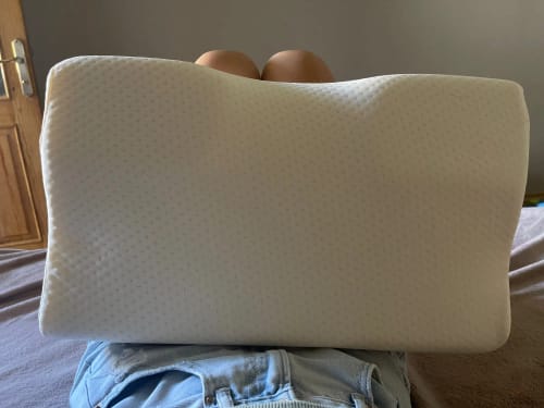 Hypoallergenic memory foam pillow, orthopedic neck support for restful and healthy sleep.