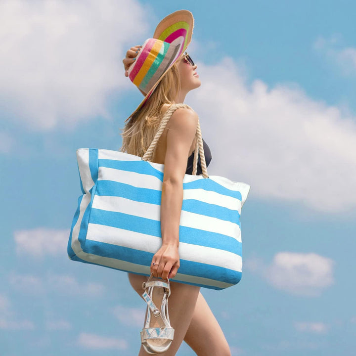Waterproof beach tote in classic blue, oversized & sandproof for endless fun.