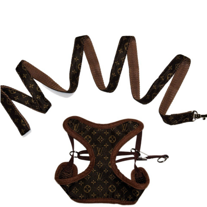 Enjoy comfortable dog walking with this padded, adjustable no-pull dog harness and leash set. Brown, for all sizes.