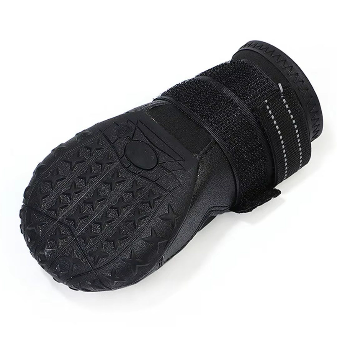 Pair of black all-weather dog boots with anti-slip sole for adventurous pet paw protection