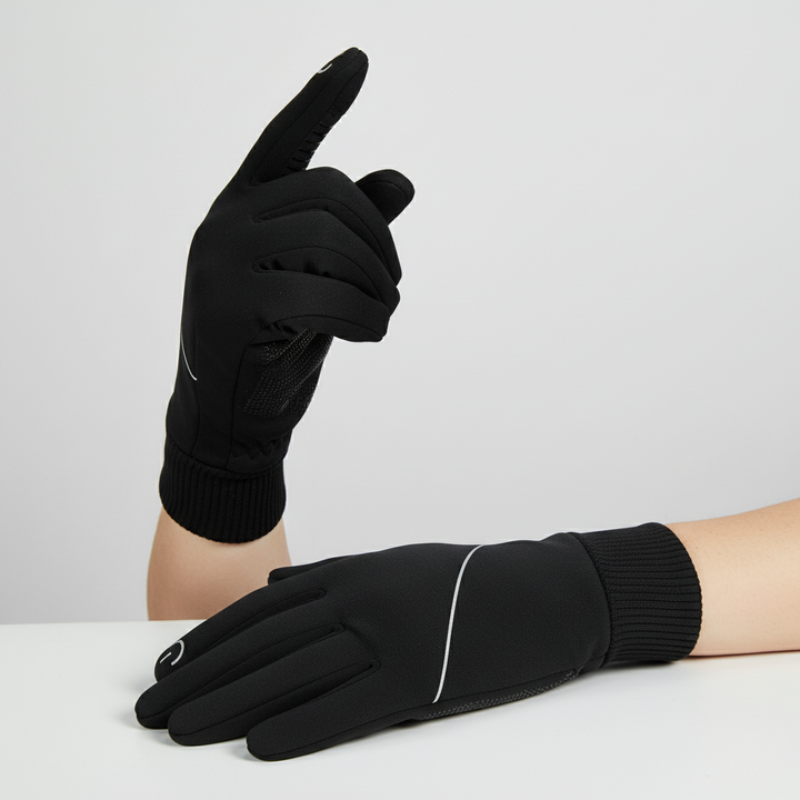 Close-up of the index fingertip of a black ThermoTouch Winter Glove, highlighting the touchscreen compatibility feature