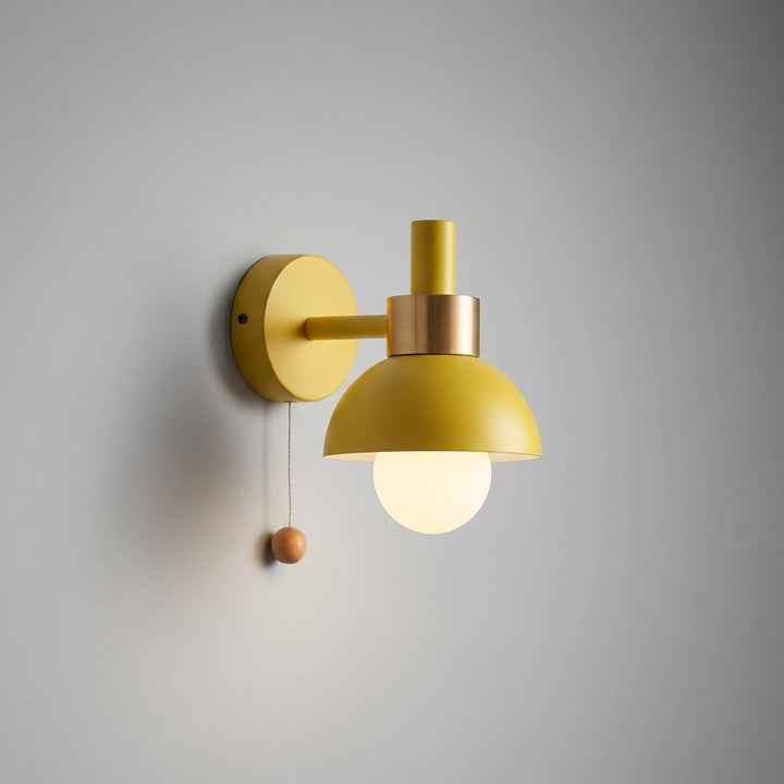 Close-up of Pastelume kids' pastel wall sconce, highlighting its unique pastel shades and pull switch.