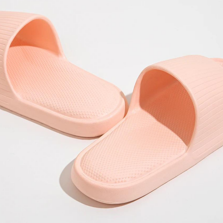 Soft pink comfort slides, anti-slip EVA material for unisex summer footwear