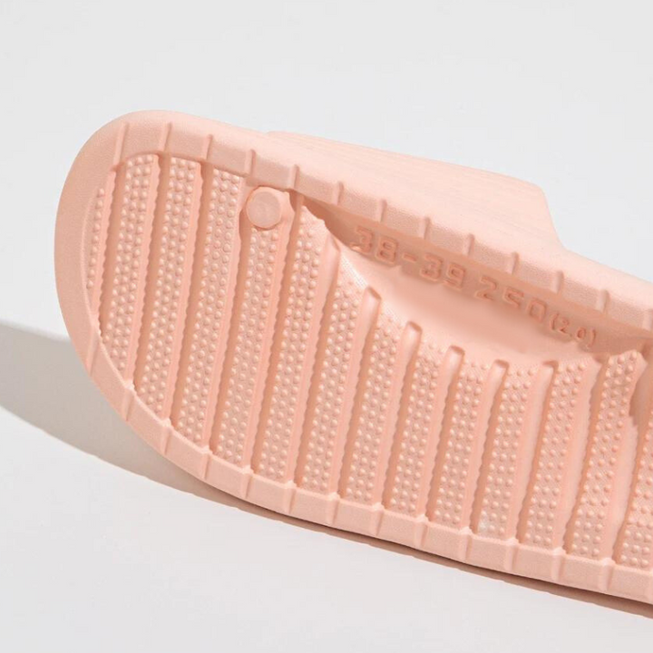 Durable pink anti-slip EVA slides, versatile for indoor and outdoor summer use