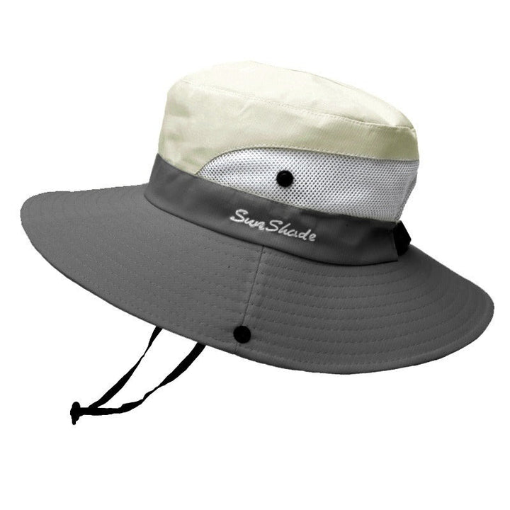 Women's travel pink wide brim sun hat with UV protection, easily packable.