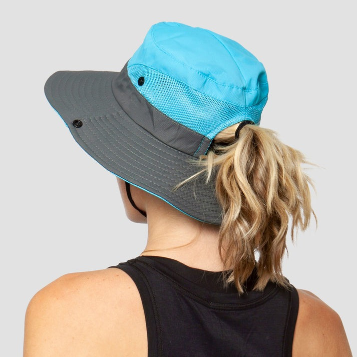 Foldable women's pink sun hat with wide brim for superior UV protection.