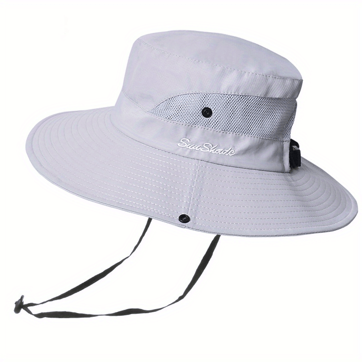Women's pink wide brim UV protection hat, perfect for outdoor summer fun.