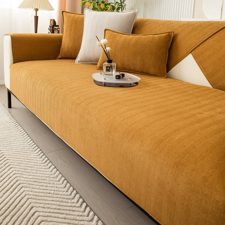 Plush chenille herringbone sectional cover. Durable, stain resistant furniture protector for active homes.