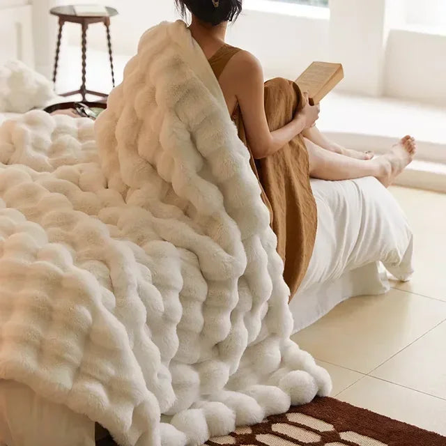 Luxurious faux fur blanket, extra soft and thick, perfect for adding warmth to any home decor