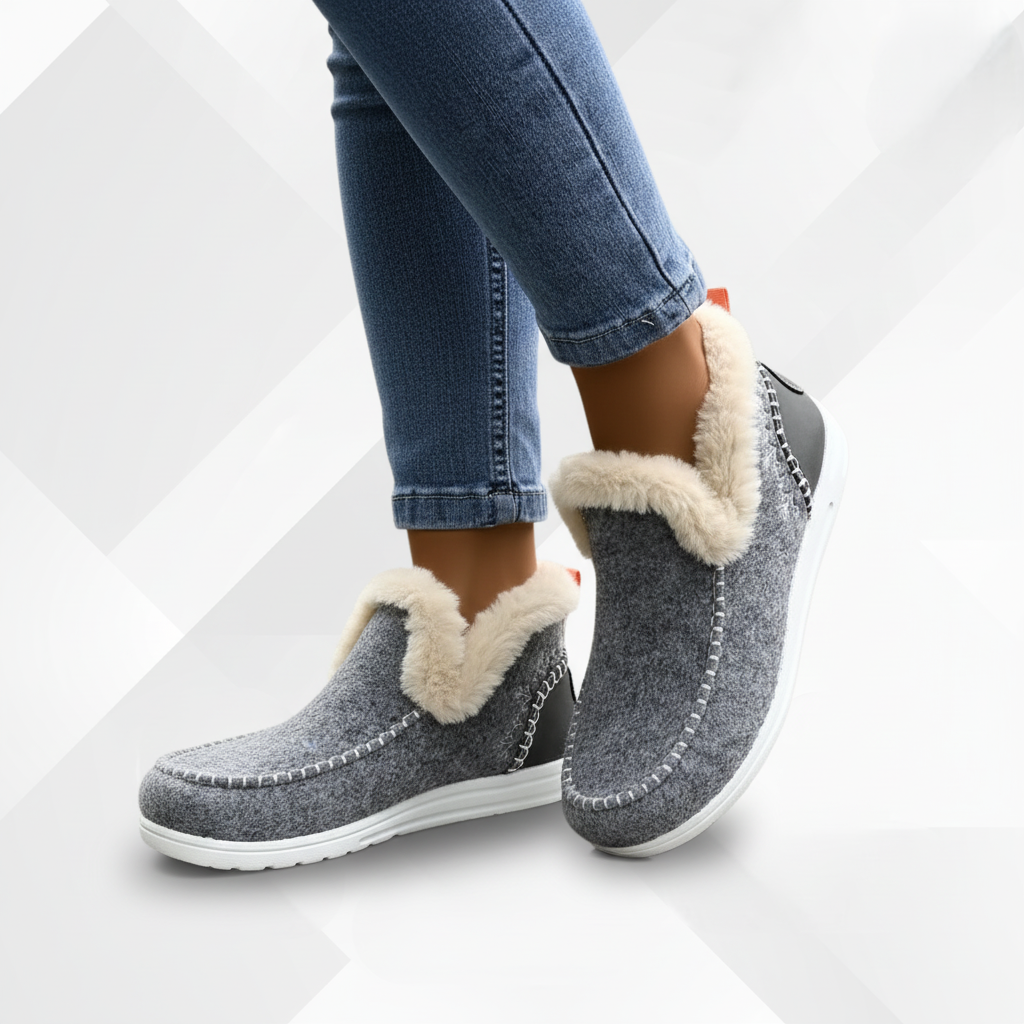 Plush-lined women's slippers with a durable non-slip sole, ensuring comfort and safety indoors and out.