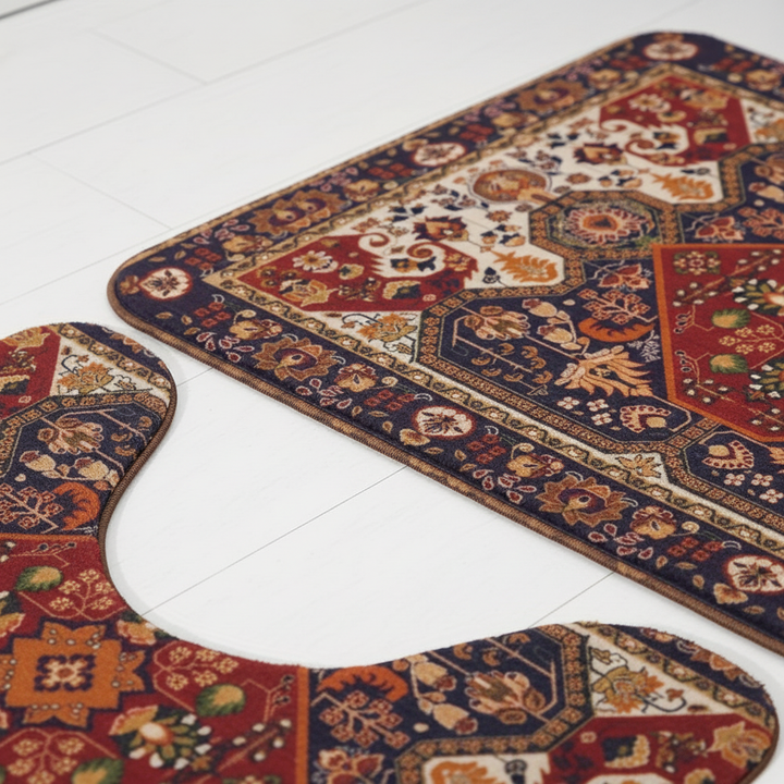 Three-piece LuxuriMat absorbent microfiber bath mat set in a beige floral design, showcasing its non-slip backing and luxurious feel for bathroom comfort.