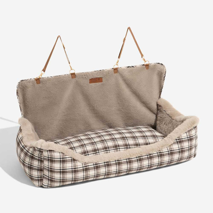 Durable & washable plush pet car seat, ensuring secure & cozy travel for your dog.