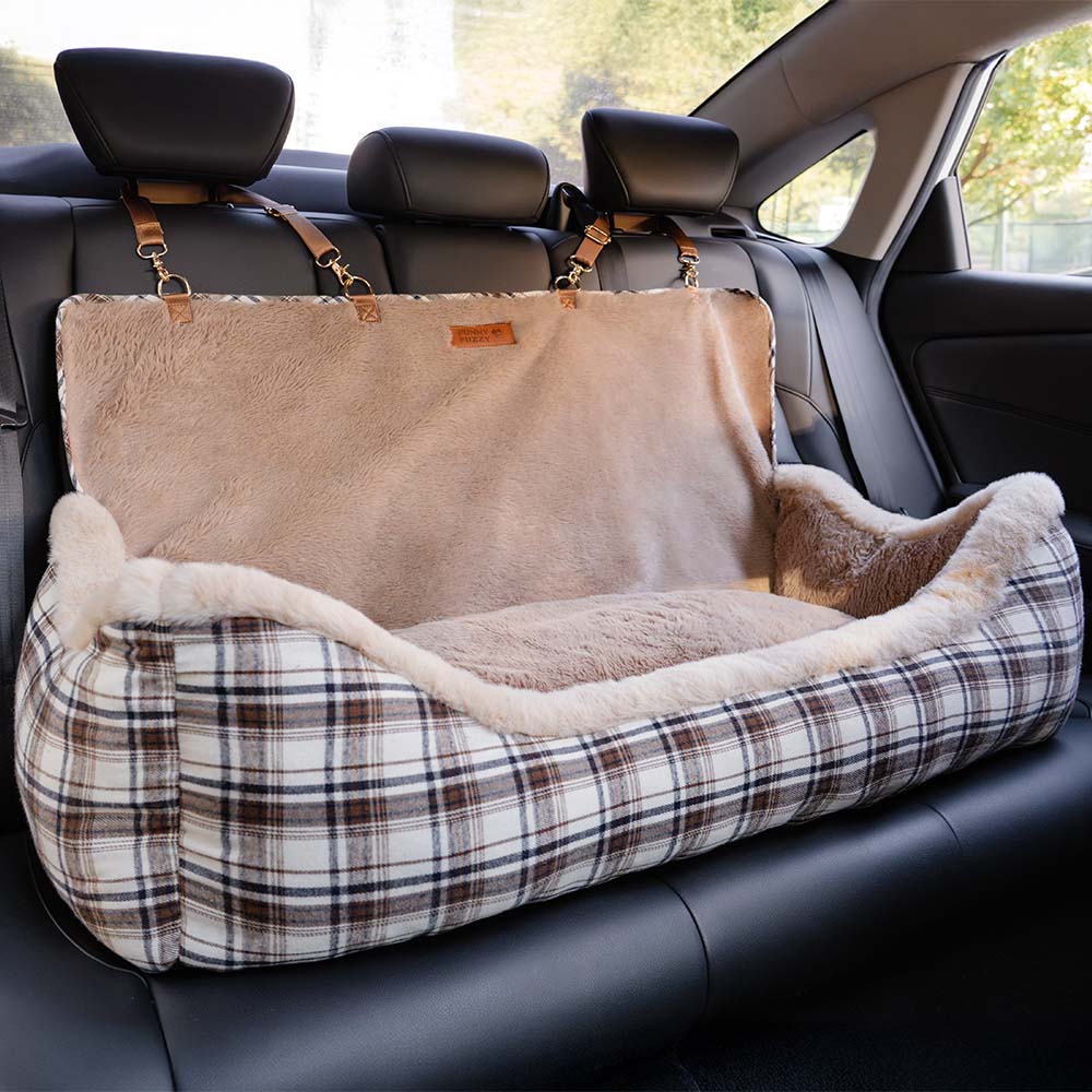 Plush pet travel seat for small & medium dogs, a washable and secure car bed.