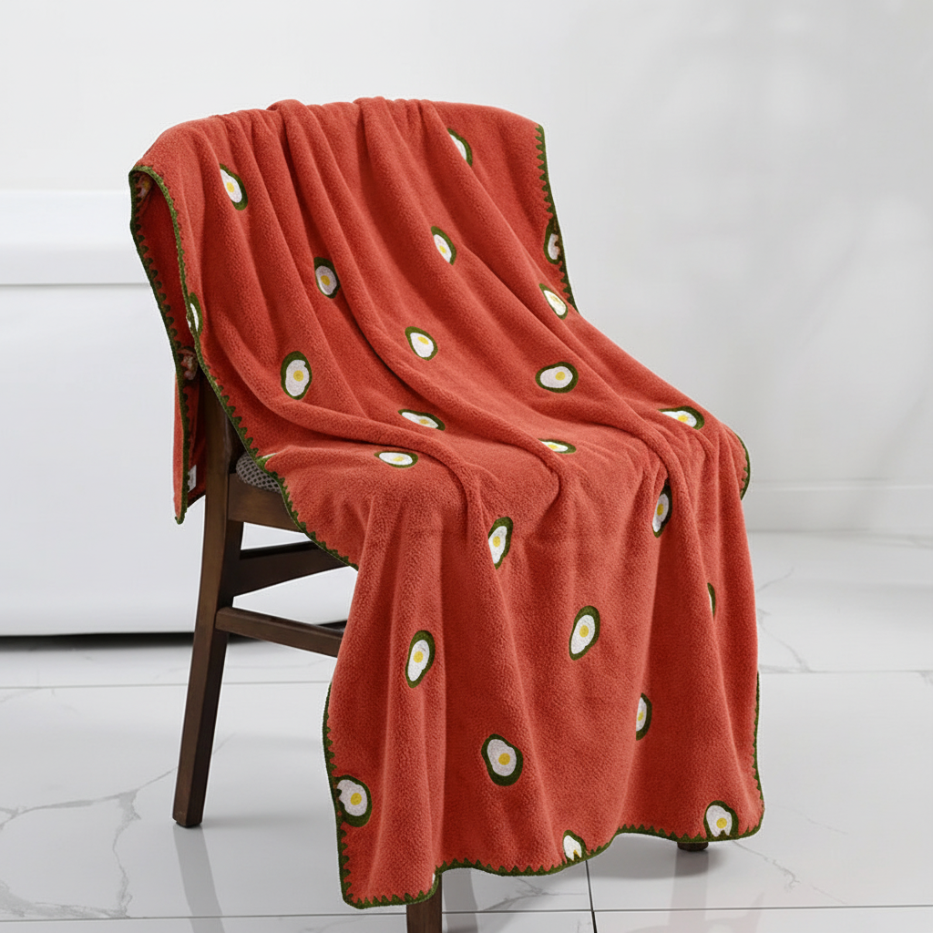 Folded quick-dry fruit embroidered absorbent bath towel, ideal for any bathroom textile