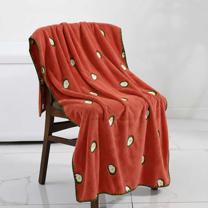 Folded quick-dry fruit embroidered absorbent bath towel, ideal for any bathroom textile