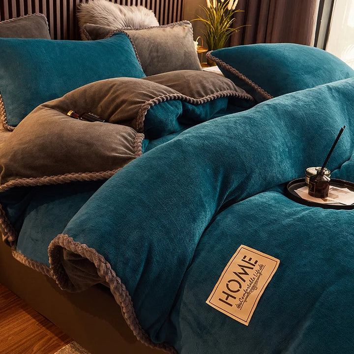 Folded velvet fleece duvet cover and pillow shams, ready to provide extra winter warmth and soft bedding.