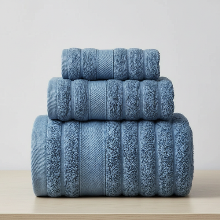 Full view of a luxury 100% cotton indulgent towel set, including bath and hand towels, a perfect unisex home essential