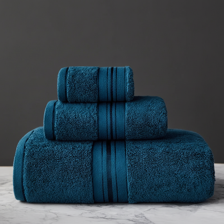 Close-up of a folded, plush cotton absorbent towel from a 3-piece bathroom set