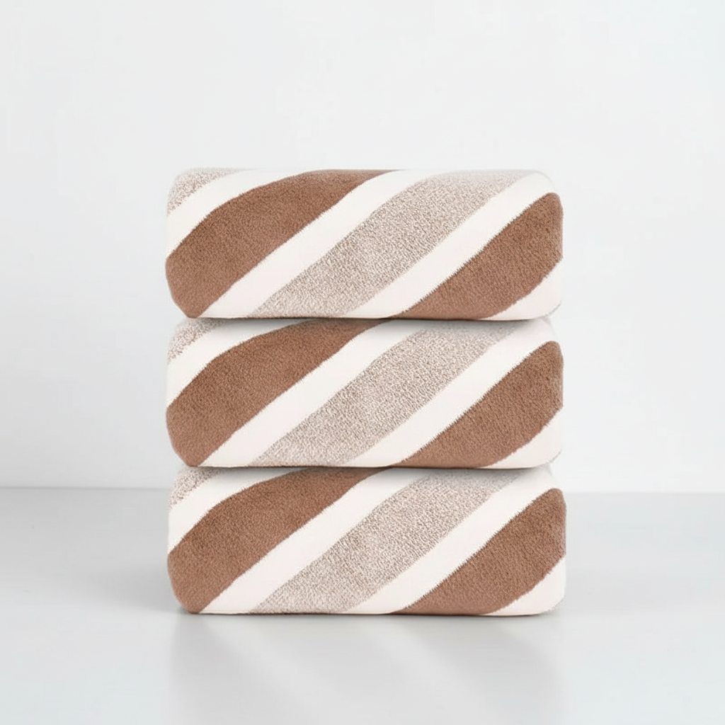 Unisex fleece bath towel draped, showing its soft, absorbent properties and knitted fabric design.