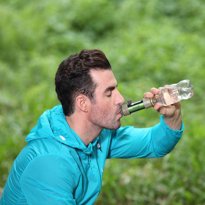 Compact emergency water filter for survival kits, ensuring pure, safe hydration outdoors.