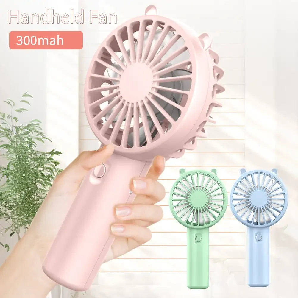 Unisex handheld fan with USB charging, a convenient summer essential cooling gadget.