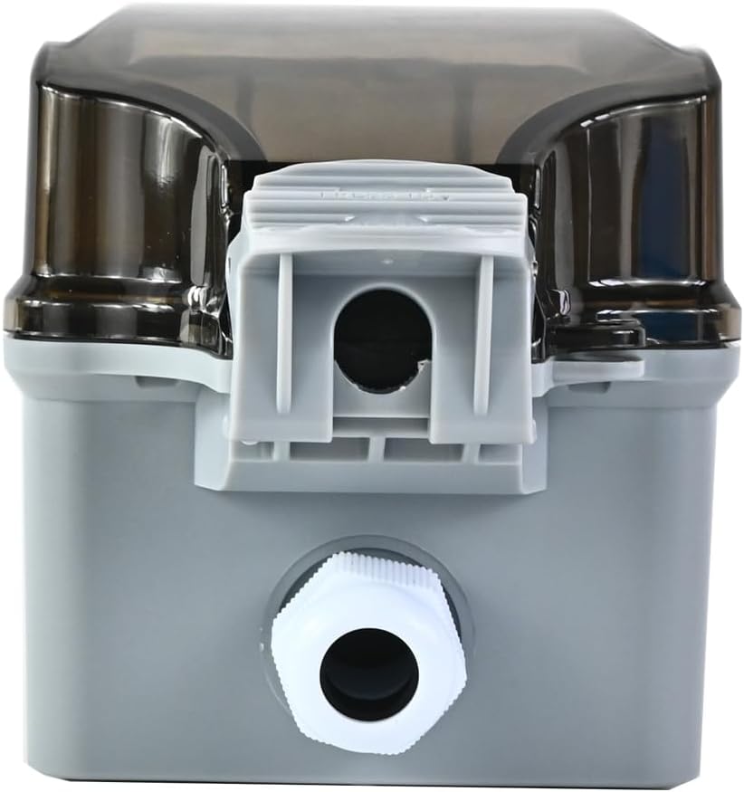 Outdoor waterproof wall socket with lockable cover installed on an exterior brick wall, garden power solution.