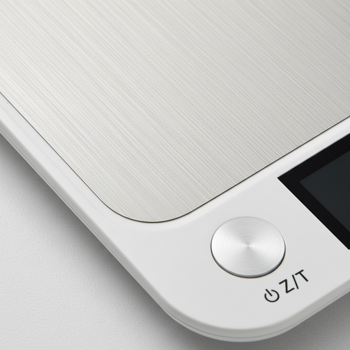 High-precision digital kitchen scale with waterproof stainless steel platform for reliable cooking & baking results.