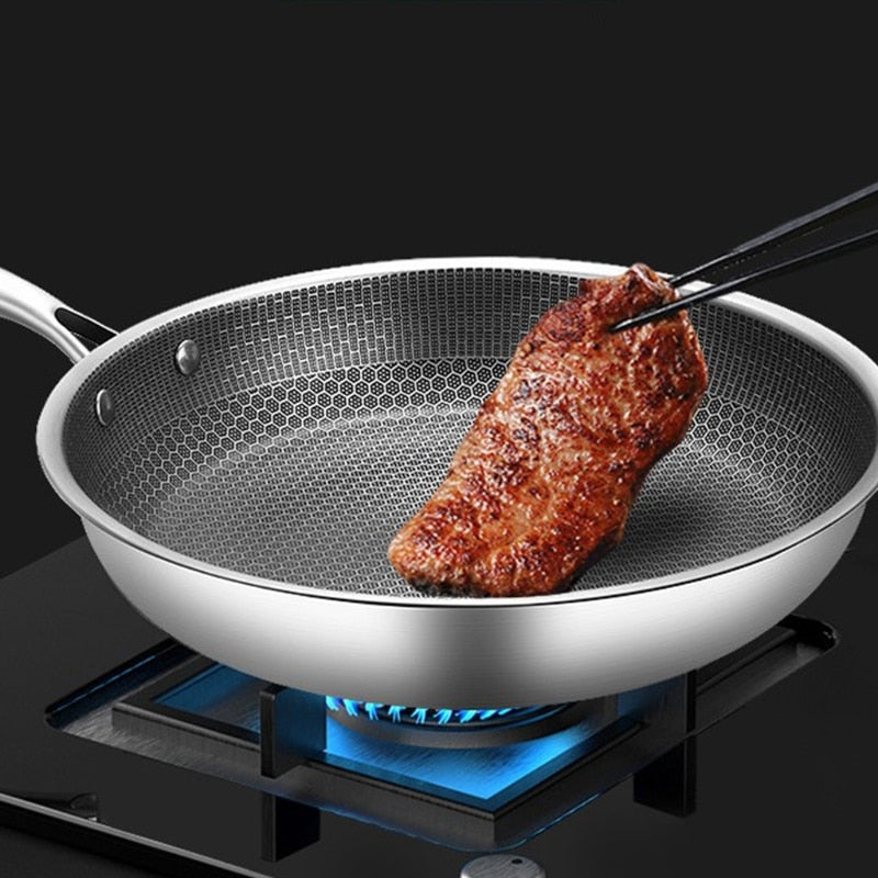 ProCook Elite non-stick frying pan. Scratch-resistant stainless steel, durable everyday cooking. Induction & oven safe.