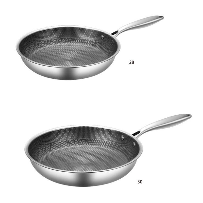 Sleek stainless steel non-stick frying pan. Scratch-resistant for longevity. Perfect durable cookware for home chefs.