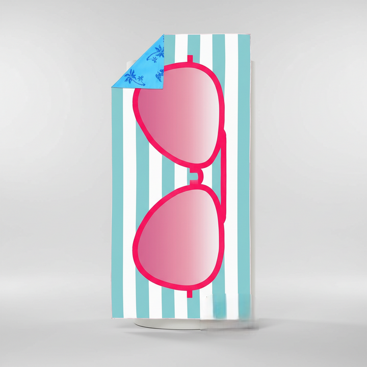 Durable and quick-drying TropicalTouch beach towel, offering a beautiful tropical print for any vacation