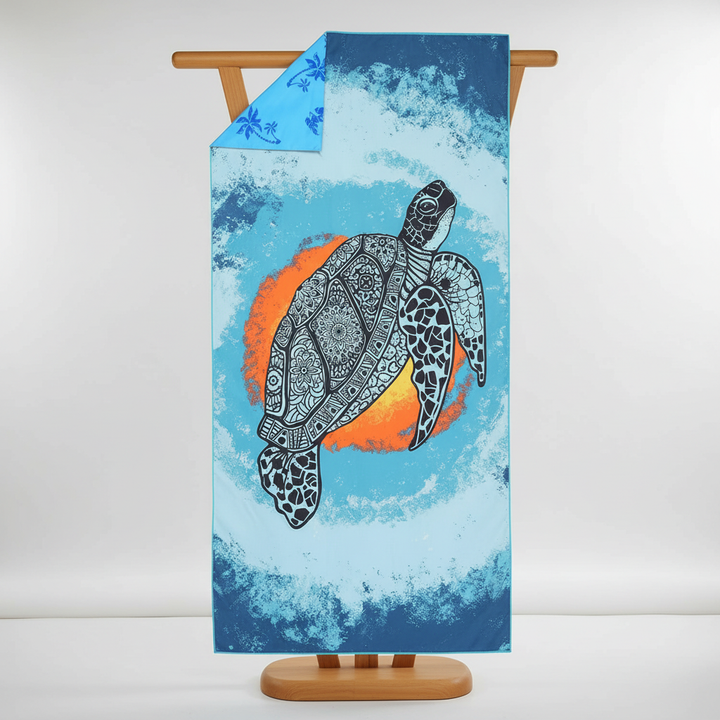 Compact TropicalTouch quick-drying beach and travel towel, showcasing a fun and lively tropical pattern