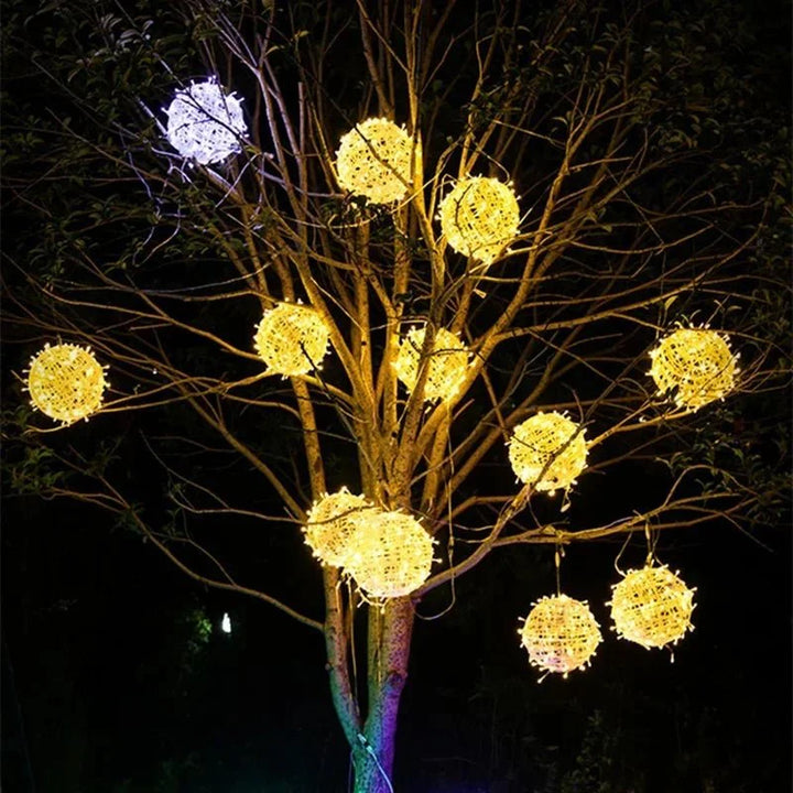 Round rattan LED light ball, providing elegant indoor outdoor accent lighting.