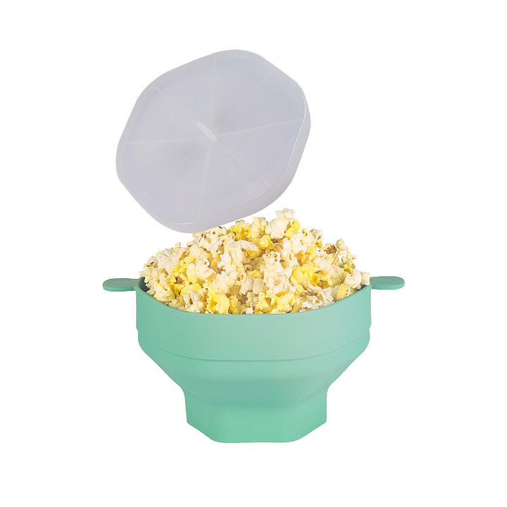 Collapsible silicone microwave popcorn bowl for easy storage. Reusable, healthy, convenient kitchen snack maker.