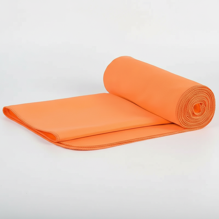 Quick-dry towel drying on a rack, showing its fast-drying and absorbent qualities