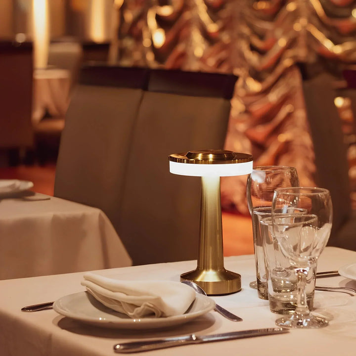 Retro dimmable LED table lamp, wireless and portable for ambient home decor.