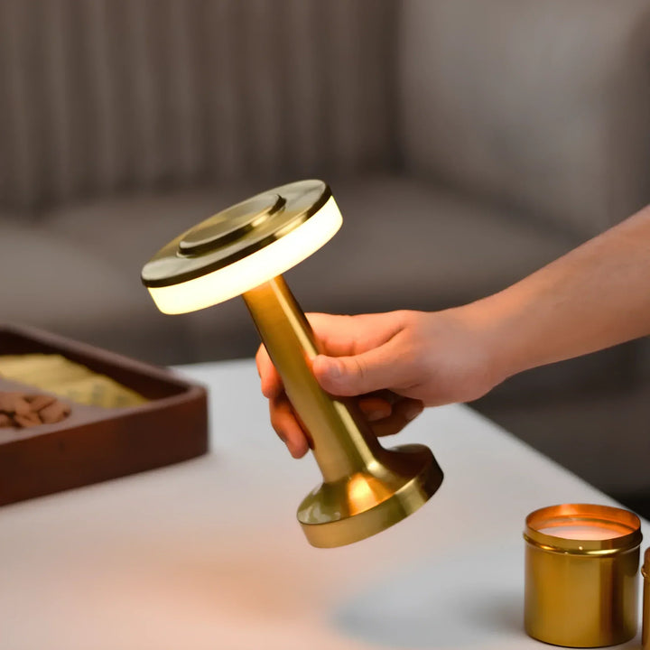Durable metal wireless retro LED lamp, dimmable & portable home decor piece.