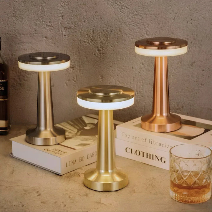 Contemporary retro LED table lamp, wireless, dimmable, and energy-efficient.