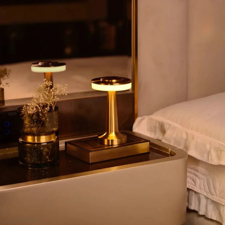 Portable metal retro LED lamp, dimmable for versatile ambient lighting & decor.