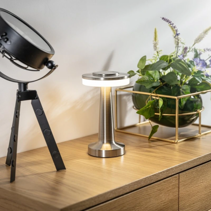 Modern retro LED table lamp, wireless & dimmable for stylish ambient lighting.