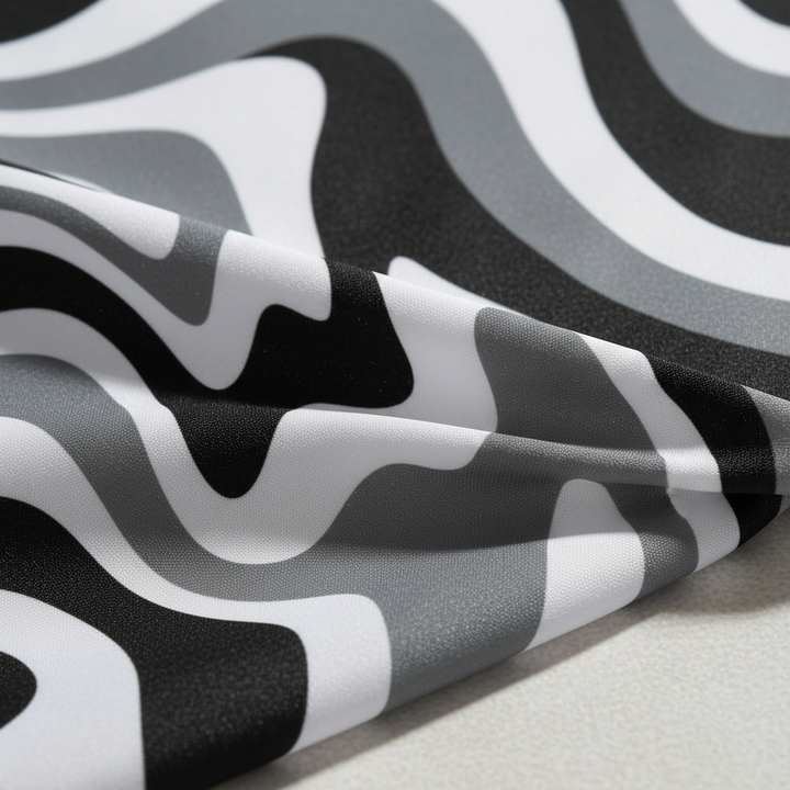 Full view of a vintage-inspired shower curtain featuring an intricate spiral pattern, durable waterproof material