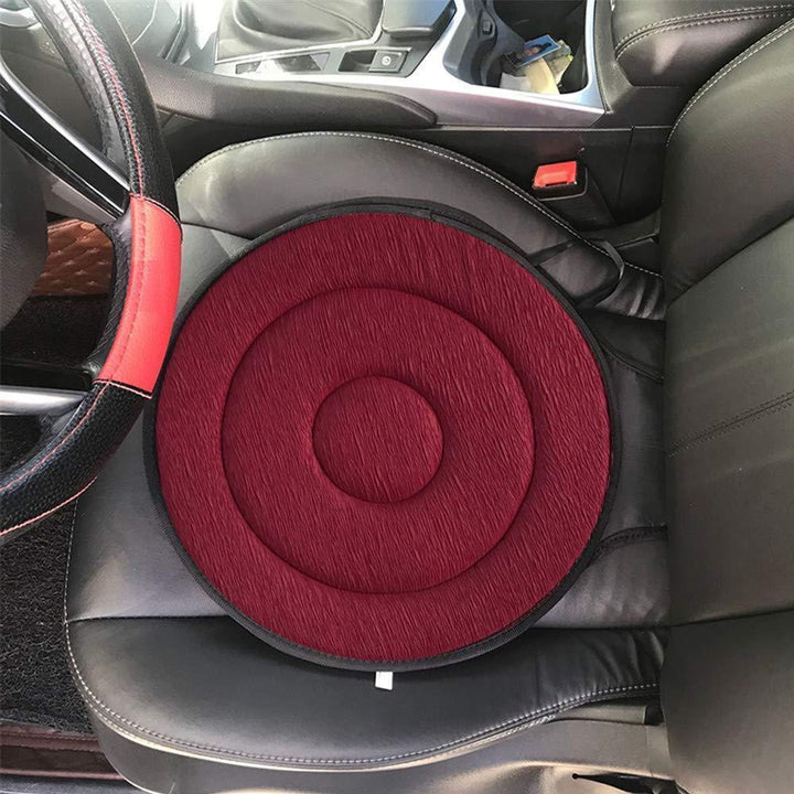 Angled view of a unisex rotatable memory foam seat cushion, showing its anti-slip design