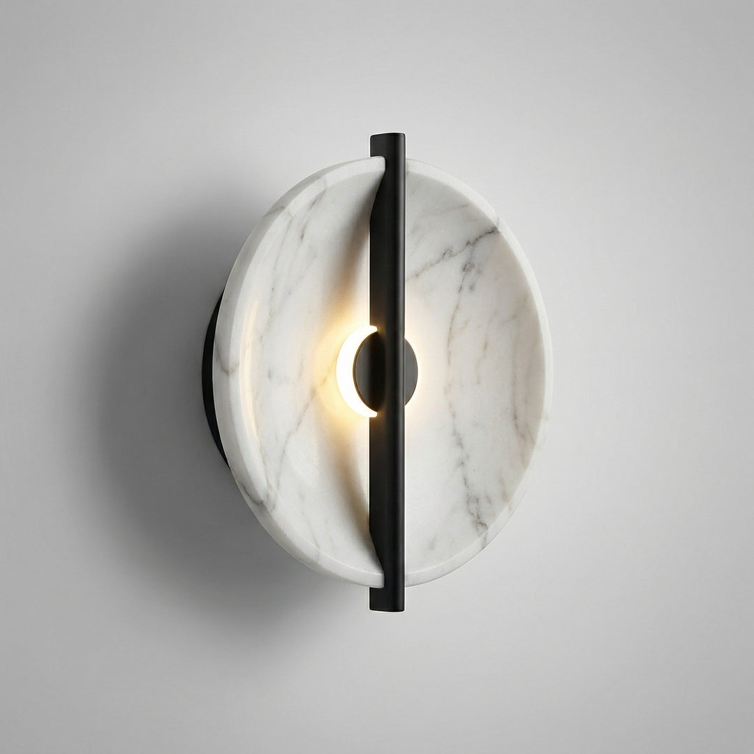 Elegant round resin wall sconce with marble effect, warm LED light for interior design.