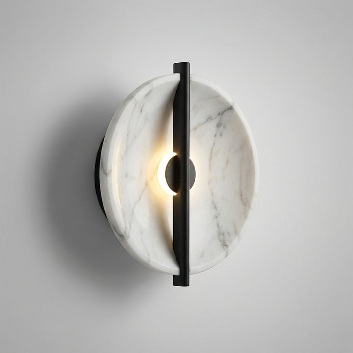 Elegant round wall sconce with marble effect, resin lamp adding sophisticated touch to interiors
