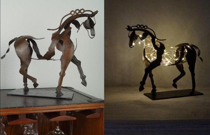 Rustic metal horse figurine, handcrafted for home decor. Elegant animal sculpture perfect as a decorative statue.