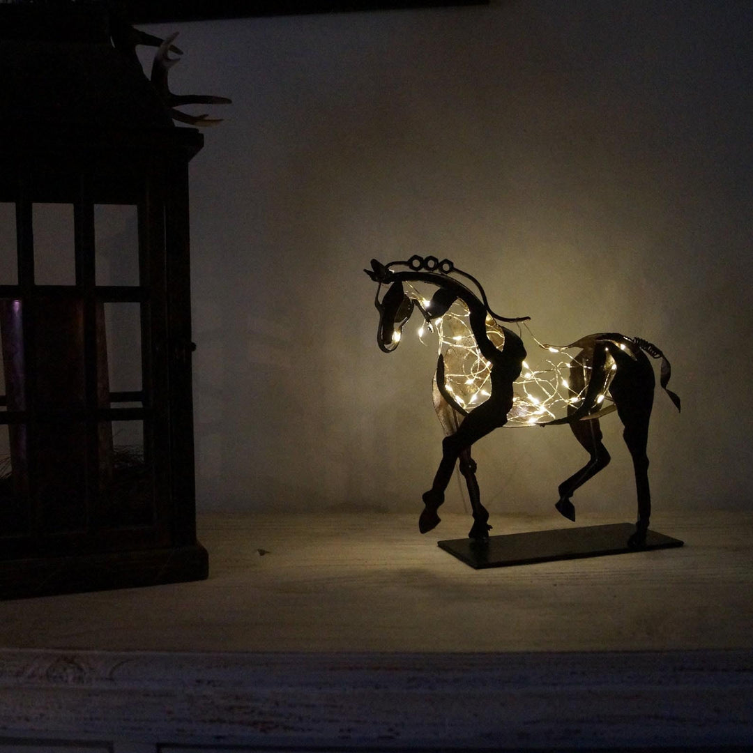 Unisex home decor metal horse figurine. Rustic handcrafted animal sculpture, perfect as a decorative statue.