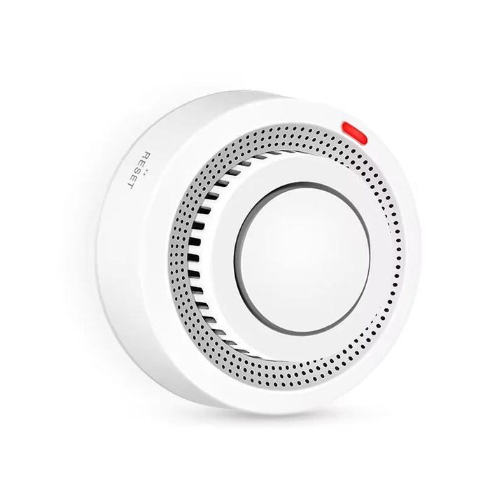 Close-up of SafeSense Smart WiFi Smoke & Heat Detector, showing LED indicator and modern design.