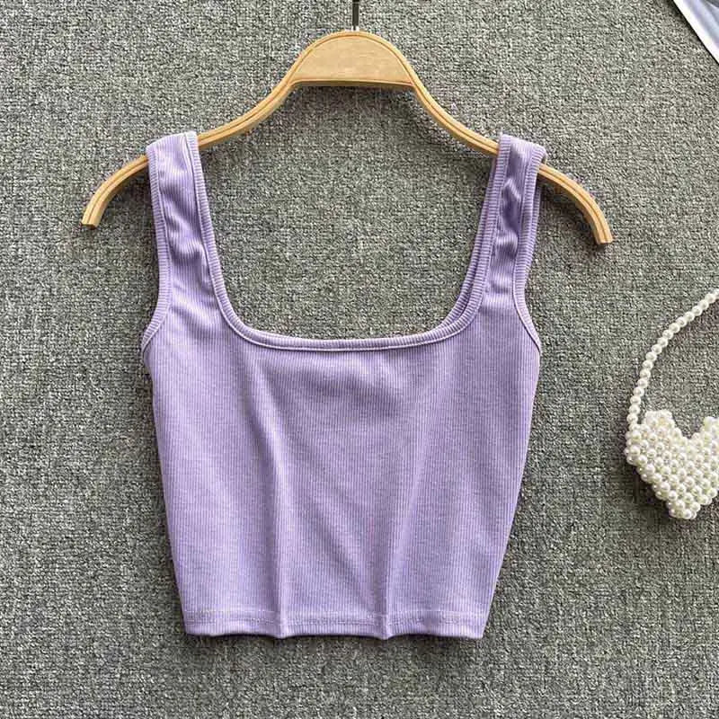 Women's versatile solid color backless tank top, cropped and seamless for comfort.