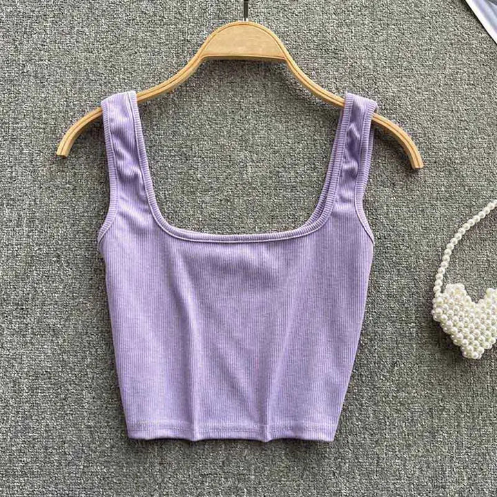 Women's versatile solid color backless tank top, cropped and seamless for comfort.